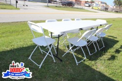 8' table with 10 folding chairs